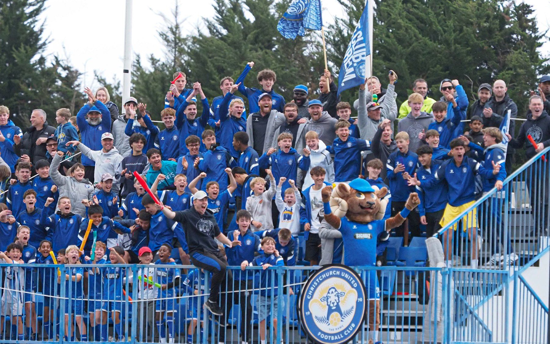 Christchurch United supporters celebrating in the stands